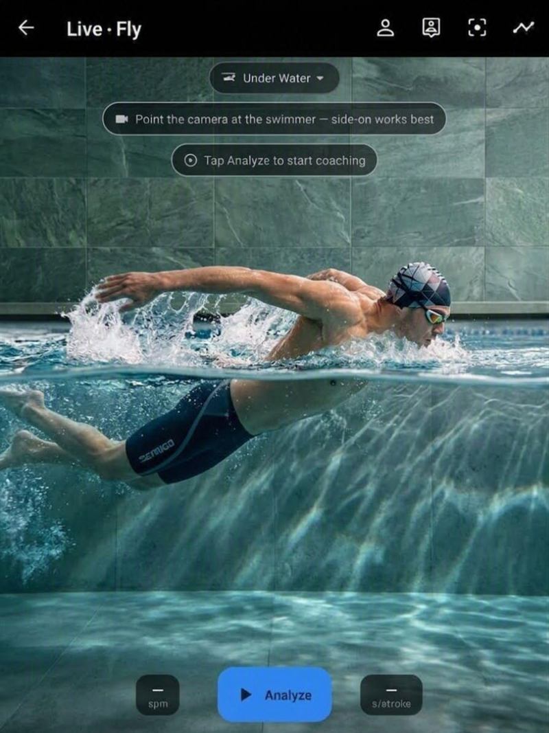 Llyr's live screen filming a butterfly swimmer split by the waterline, with the Analyze button at the bottom between the stroke-rate and seconds-per-stroke tiles.